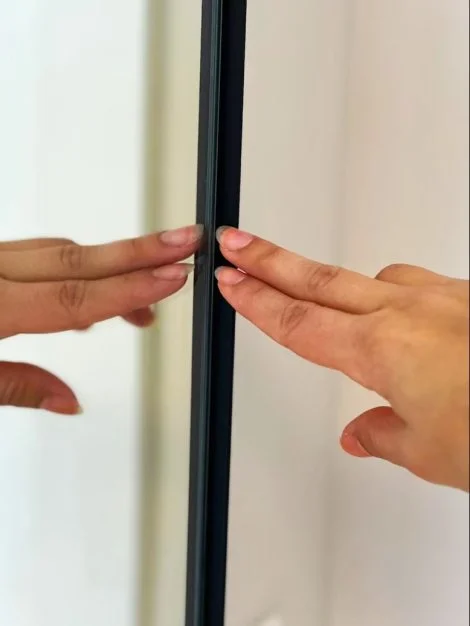 Black-Metal-Frame-Mirror-470x626 Black Capsule PC Mirror: Your Gateway to Sleek, Functional Design